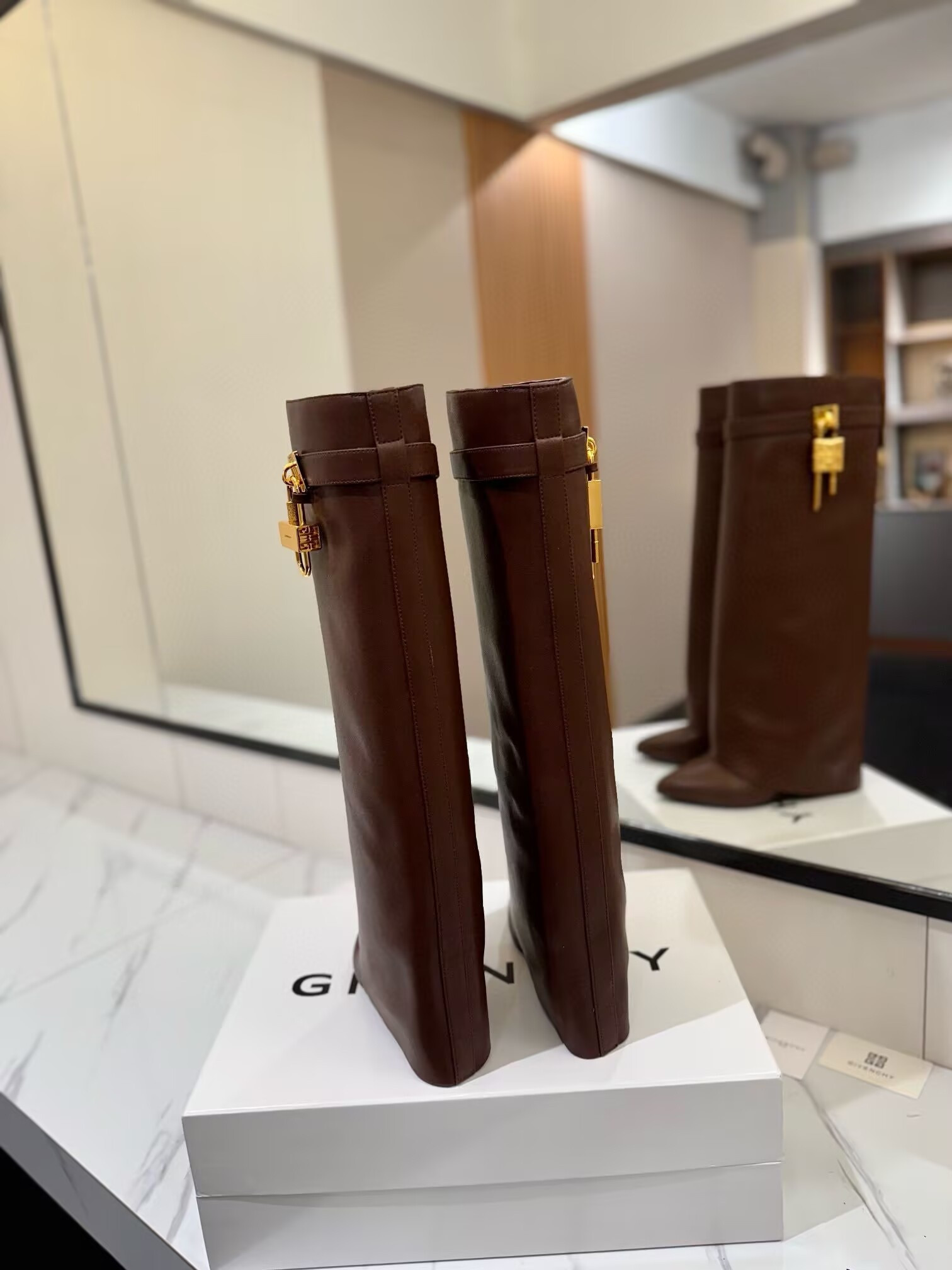 UA Givenchy Shark Lock boots in leather