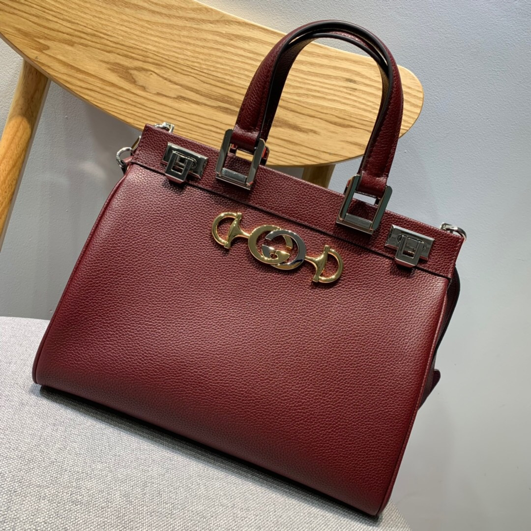 G*u*i zumi grainy leather small top handle bag