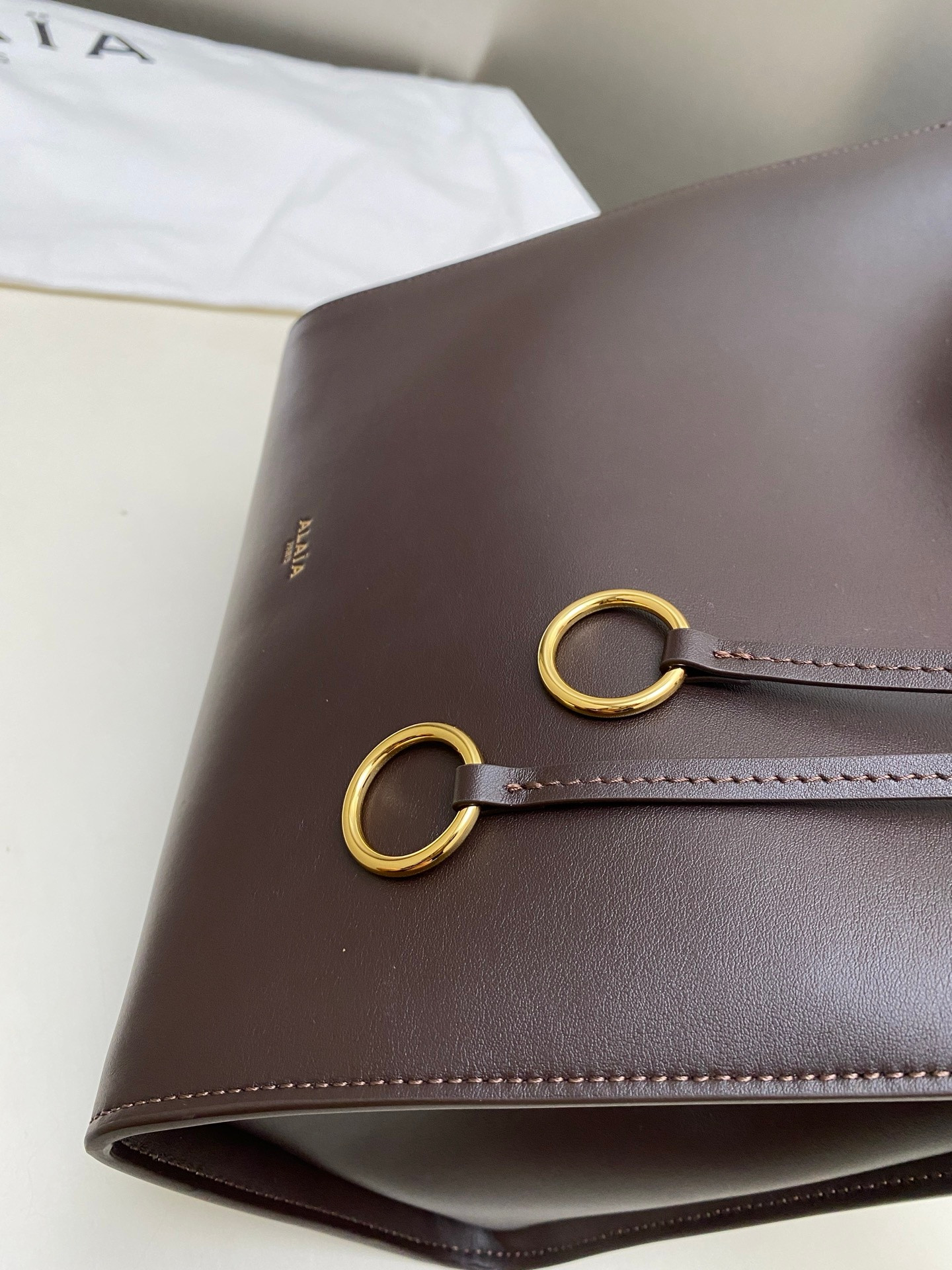 ALAÏA LE CLICK SQUARE BAG IN NUBUCK 26x14x24cm