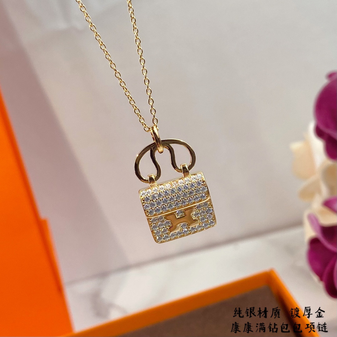 hermès fully Di*m*nd-encrusted h bag necklace