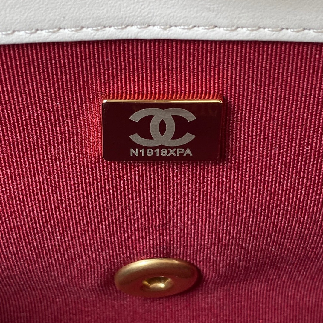 Ch*el small classic handbag grained shiny calfskin & gold-tone metal white 5.7 × 9 × 2.3 in