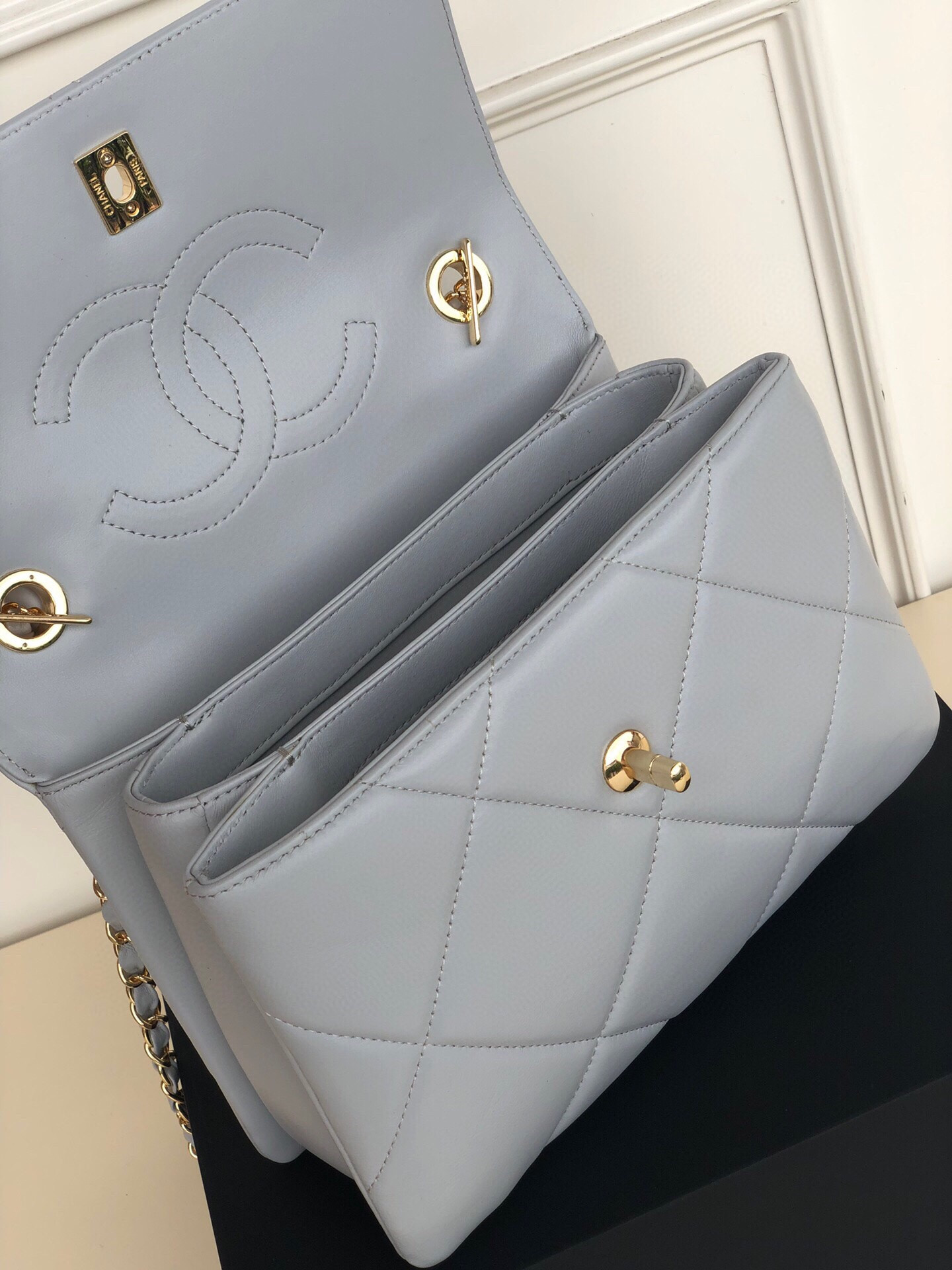 Ch*el flap bag with top handle 6.6 × 9.8 × 4.7 in