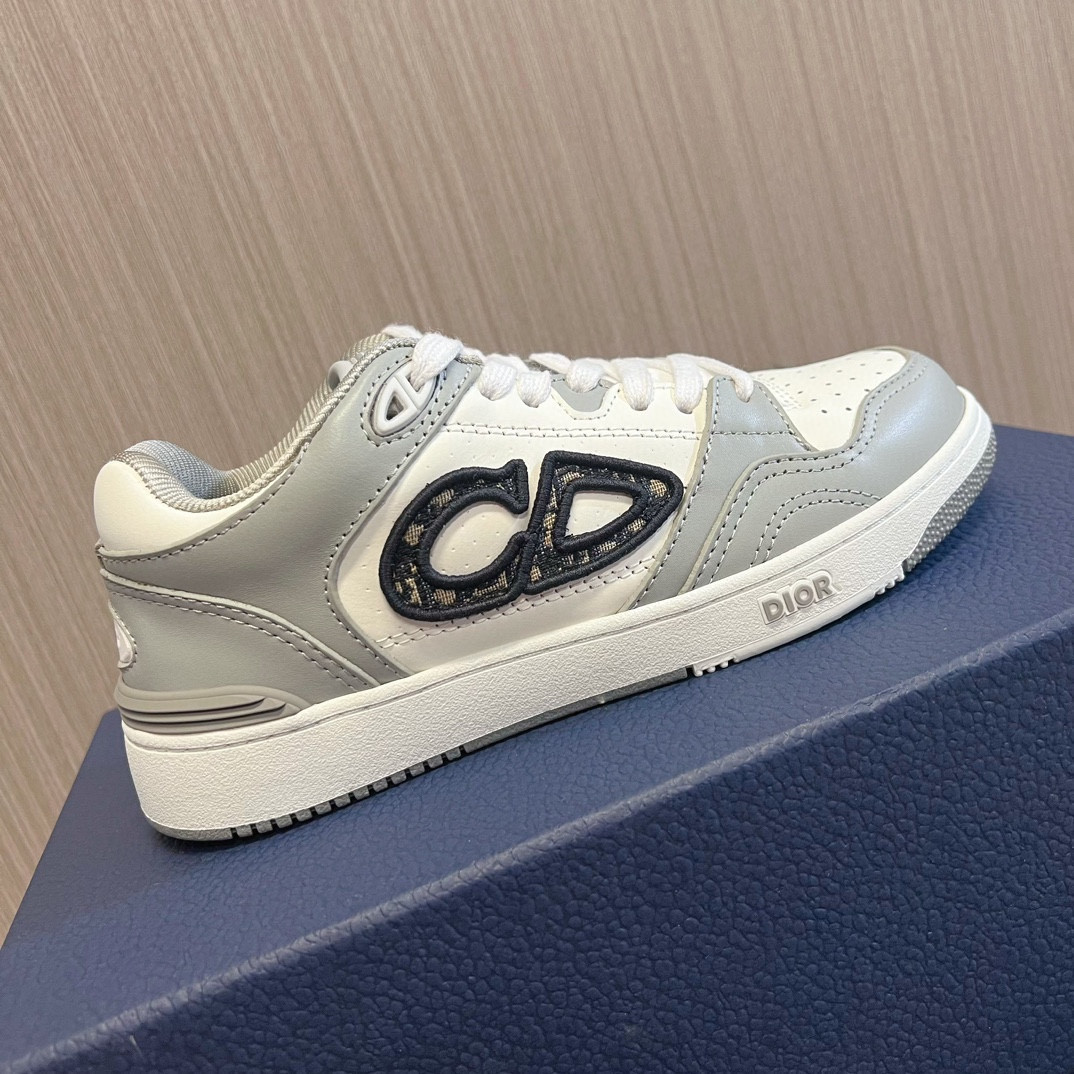 ua D*or b57 low-top sneaker  gray and white