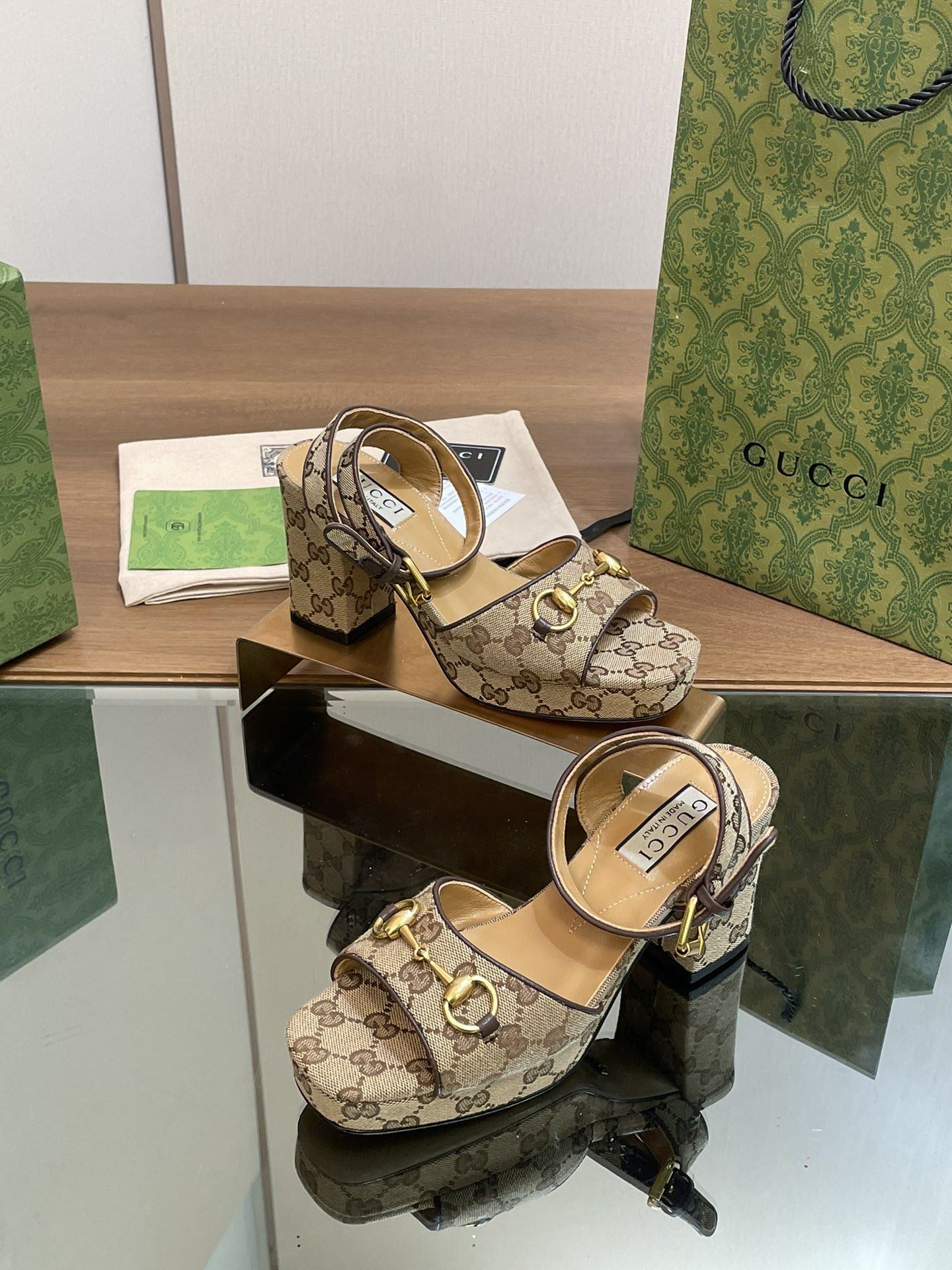 ua G*u*i horsebit platform sandal