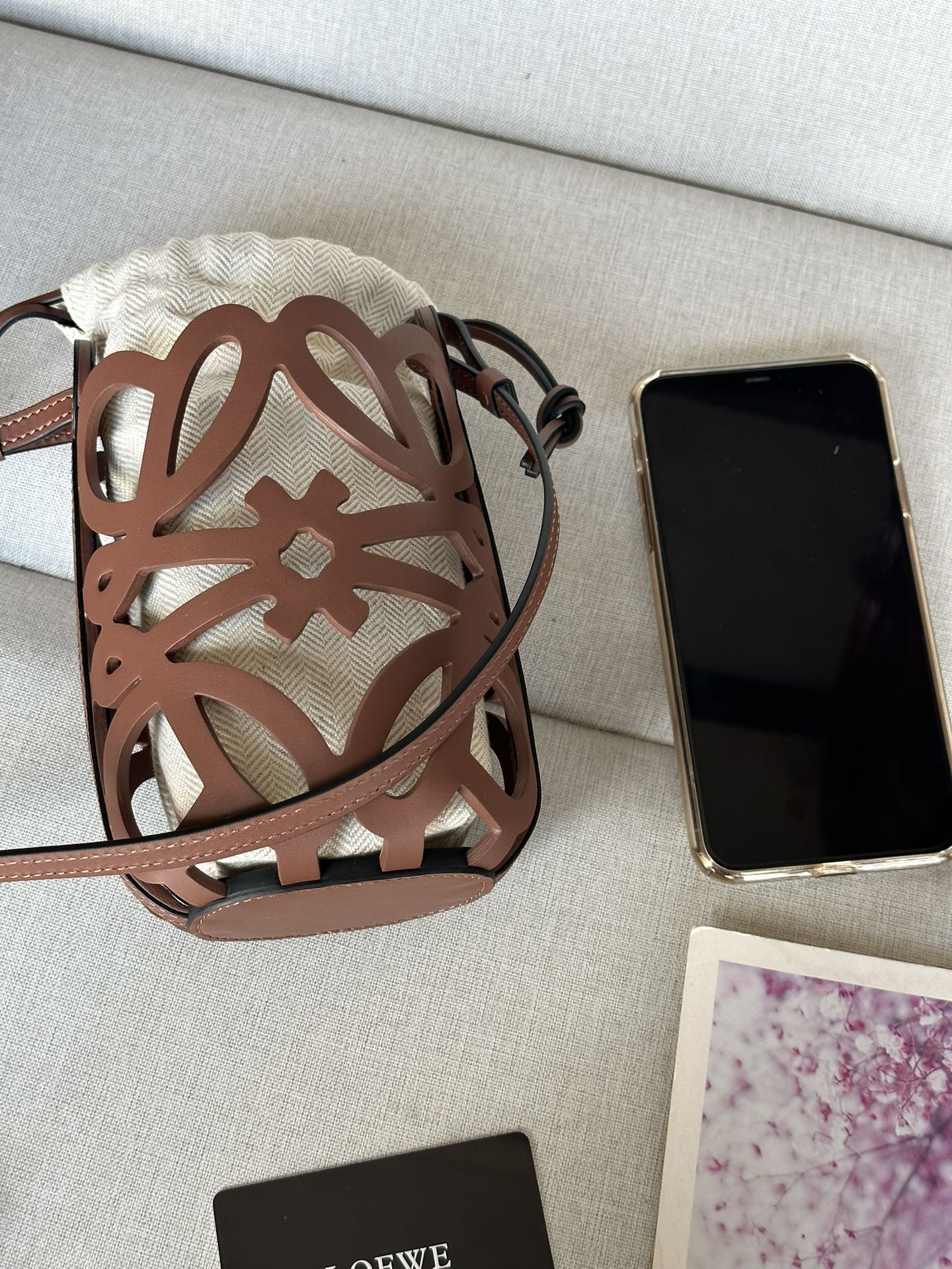 L0ew* anagram cut-out pocket in classic calfskin and canvas 20x11x8cm