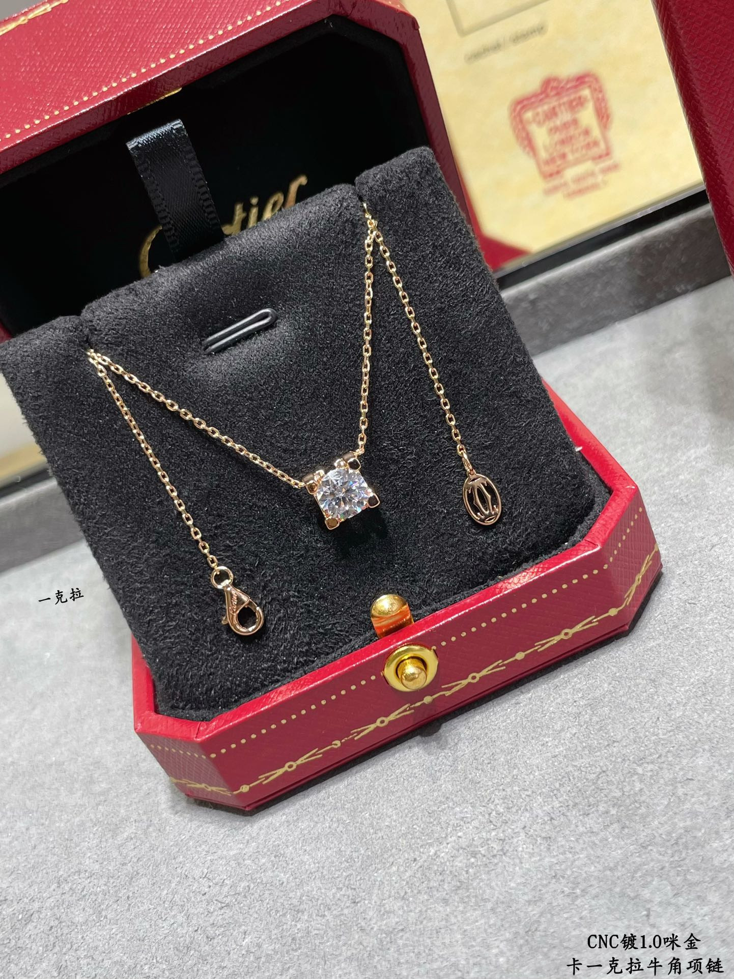 Ca*t1er One carat Horn Necklace
