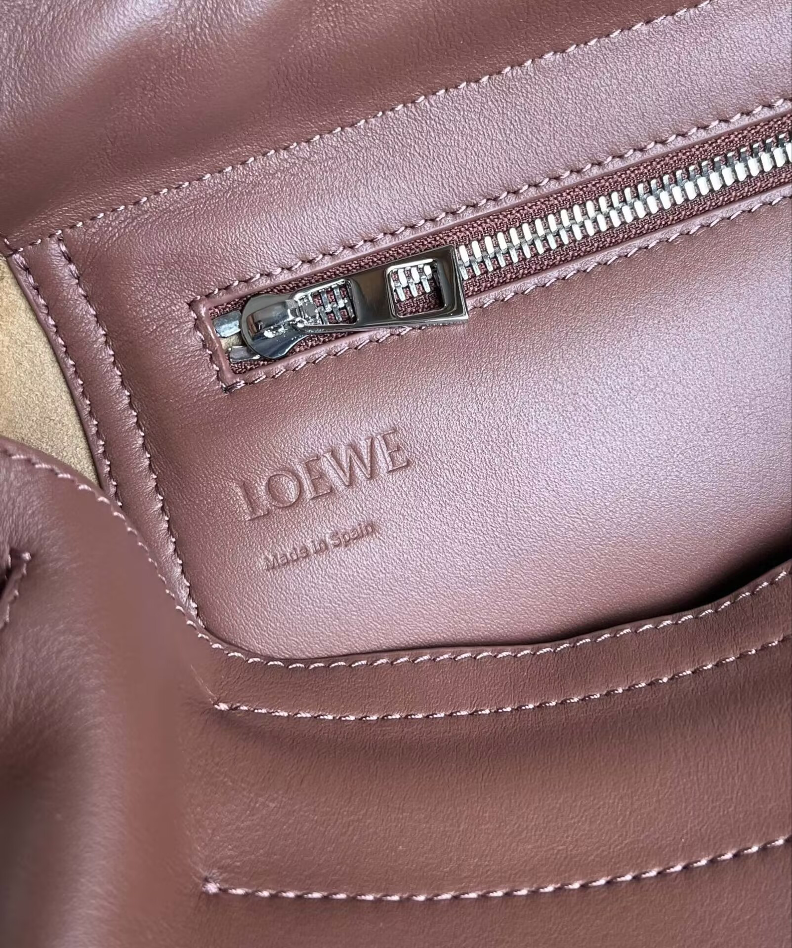 L0ew* Flamenco satchel in shiny S*pple calfskin 34x12x24cm