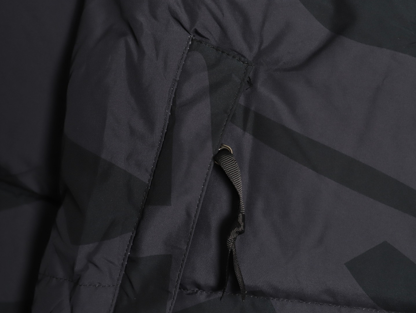 the n0r*h Fa*e x kaws short puffer jacket