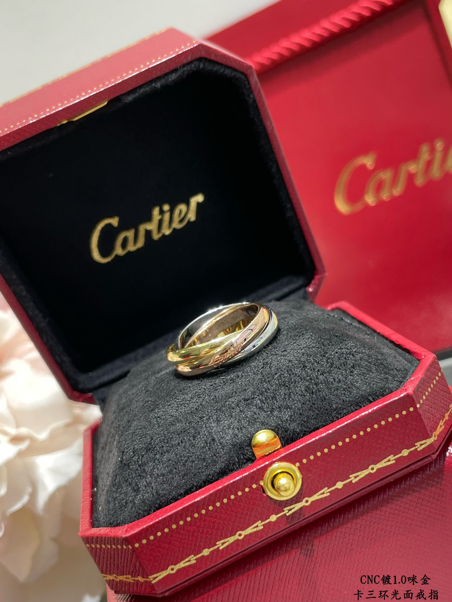 Ca*t1er three-ring polished ring