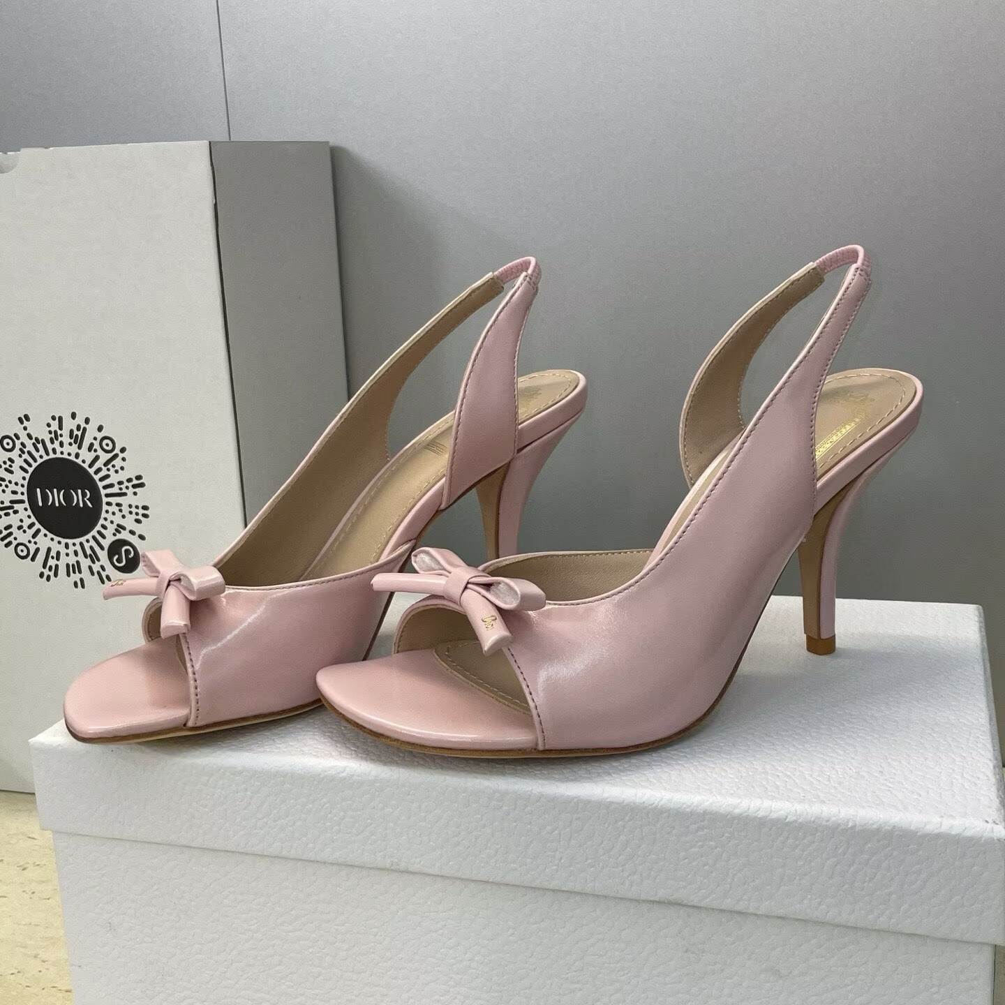 ua D10r bow heeled slingback sandal
