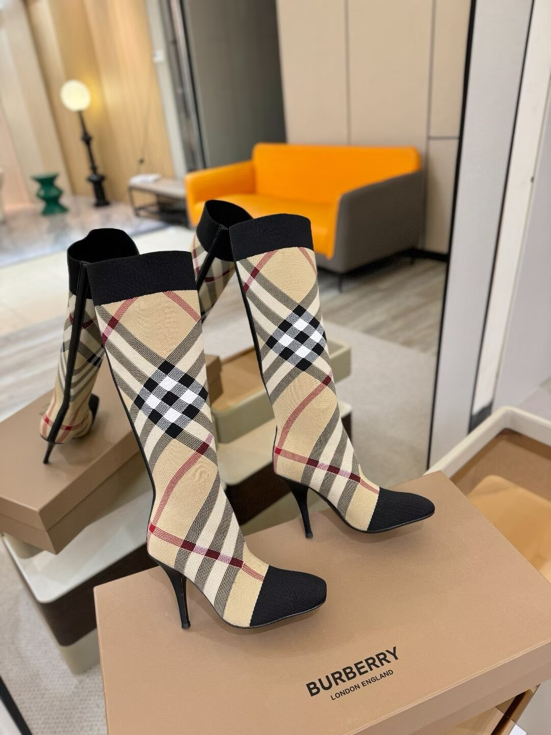 ua Bv*b*rry check high boots