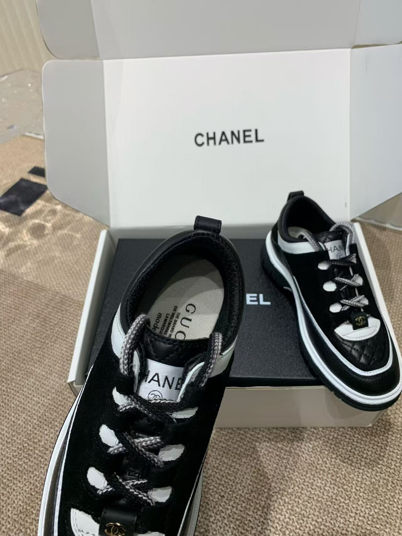 UA Ch**el Sneaker