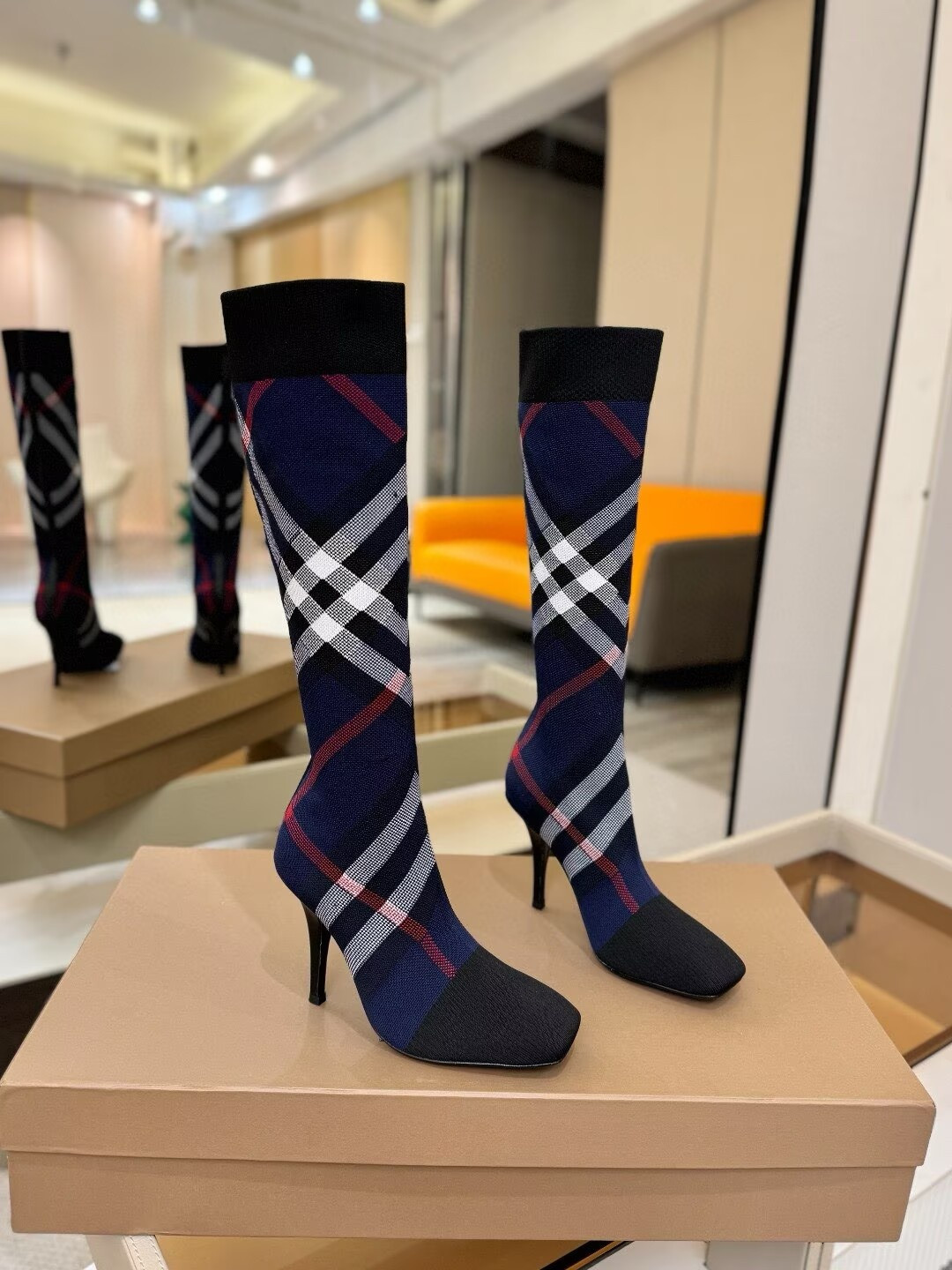 ua Bv*b*rry check high boots