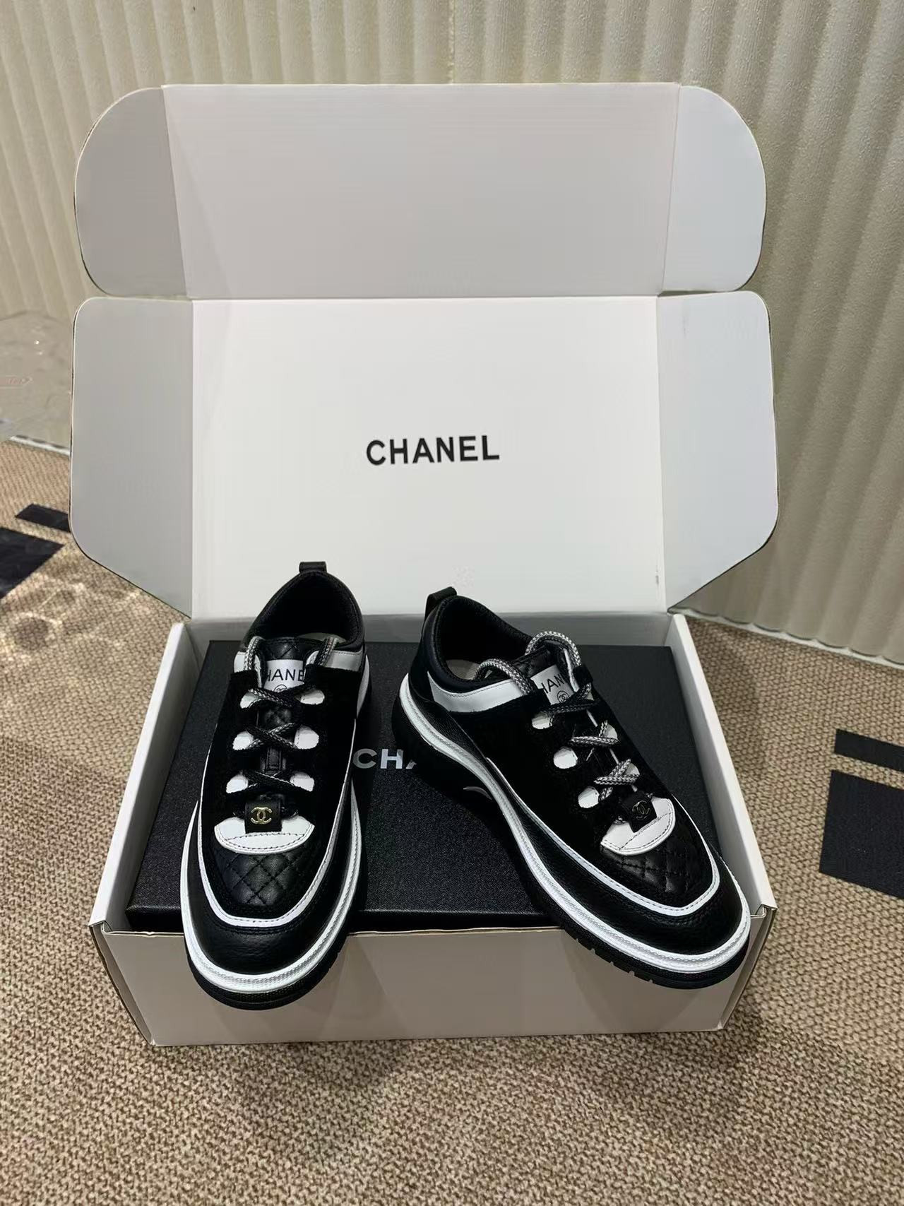 UA Ch**el Sneaker