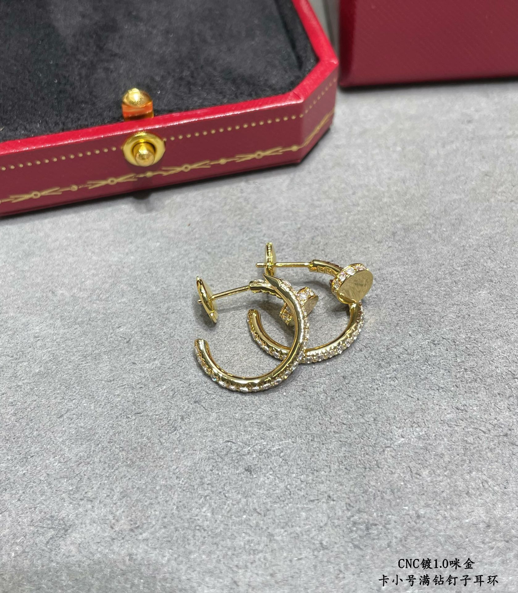 Ca*t1er Fully D1am0nd-encrusted small nail Earrings