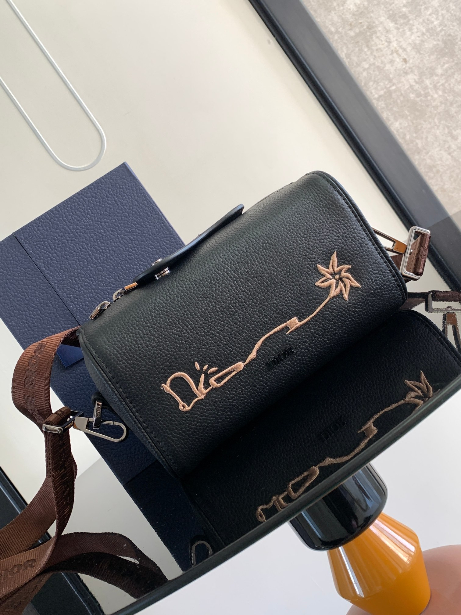 D10r Lingot Toiletry Bag GRAINED LEATHER BLACK Black Oblique Mirage Technical Fabric 8.5 x 5 x 4 inches