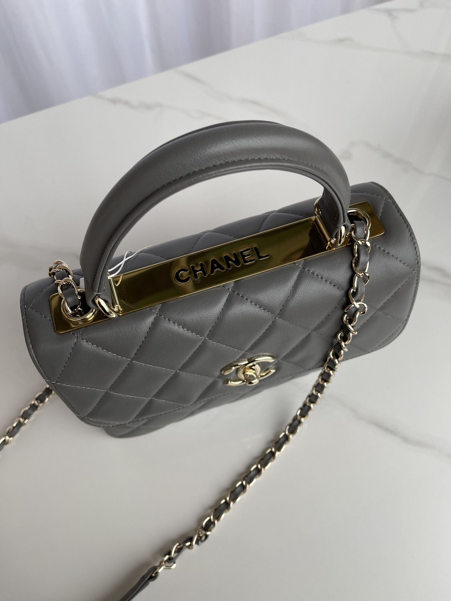 Ch**el FLAP BAG WITH TOP HANDLE 6.6 × 9.8 × 4.7 in