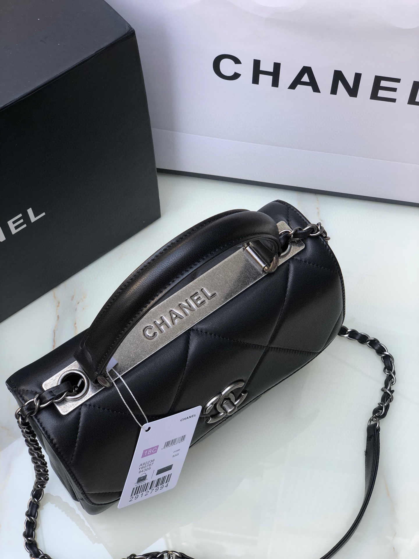 Ch**el FLAP BAG WITH TOP HANDLE 6.6 × 9.8 × 4.7 in